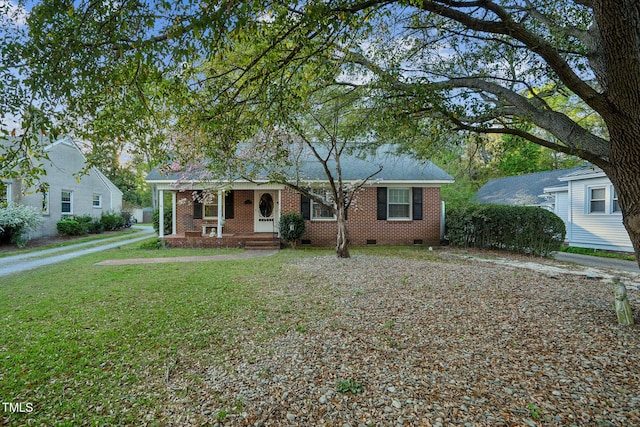 418 S 2nd St, Smithfield, NC 27577 - view of front of home featuring brick siding, a porch, a front lawn, and crawl space