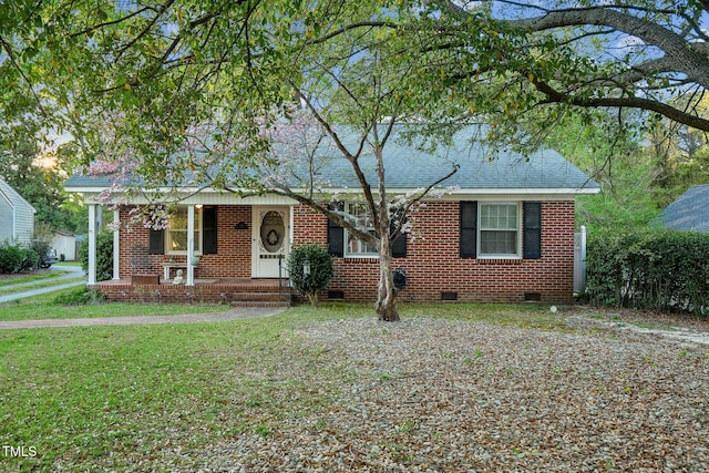 418 S 2nd St, Smithfield, NC 27577 - single story home featuring brick siding, a front lawn, covered porch, and crawl space