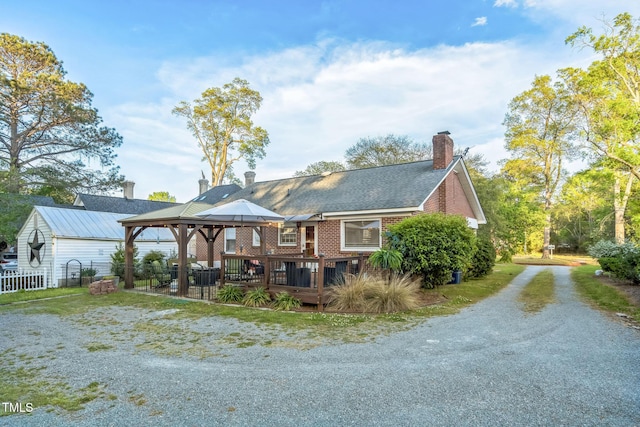 418 S 2nd St, Smithfield, NC 27577 - rear view of house featuring fence, a gazebo, a chimney, and driveway