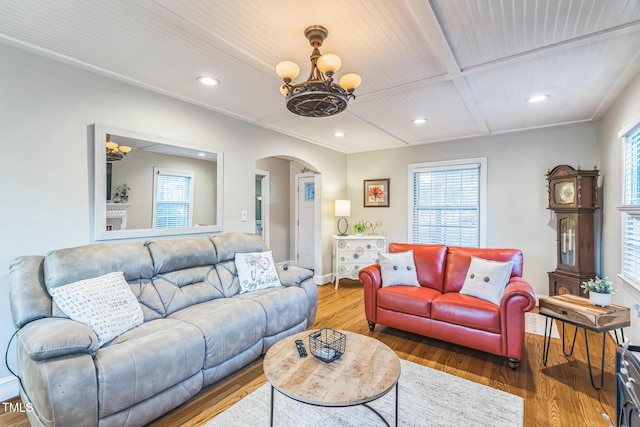 418 S 2nd St, Smithfield, NC 27577 - living room with an inviting chandelier, arched walkways, and a healthy amount of sunlight