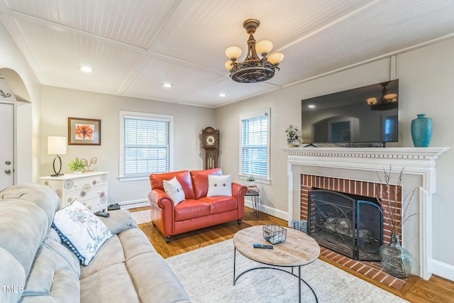 418 S 2nd St, Smithfield, NC 27577 - living room with a baseboard radiator, plenty of natural light, and wood finished floors