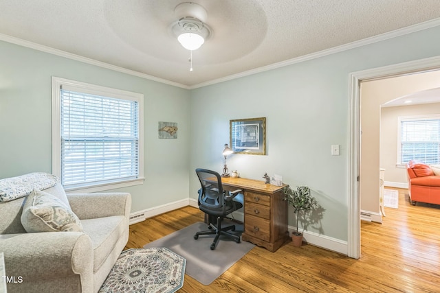 418 S 2nd St, Smithfield, NC 27577 - office area featuring arched walkways, a ceiling fan, ornamental molding, and wood finished floors