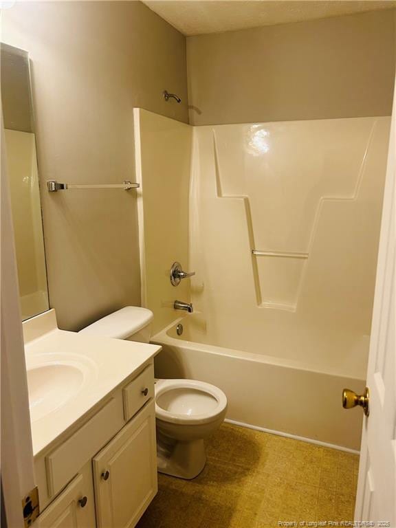 full bath featuring toilet, vanity, shower / washtub combination, and tile patterned floors