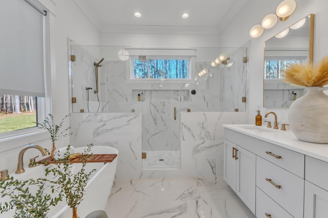 bathroom featuring vanity, a freestanding tub, a marble finish shower, ornamental molding, and marble finish floor