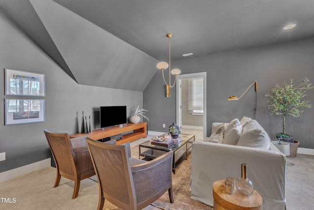 living room with baseboards, carpet floors, visible vents, and vaulted ceiling