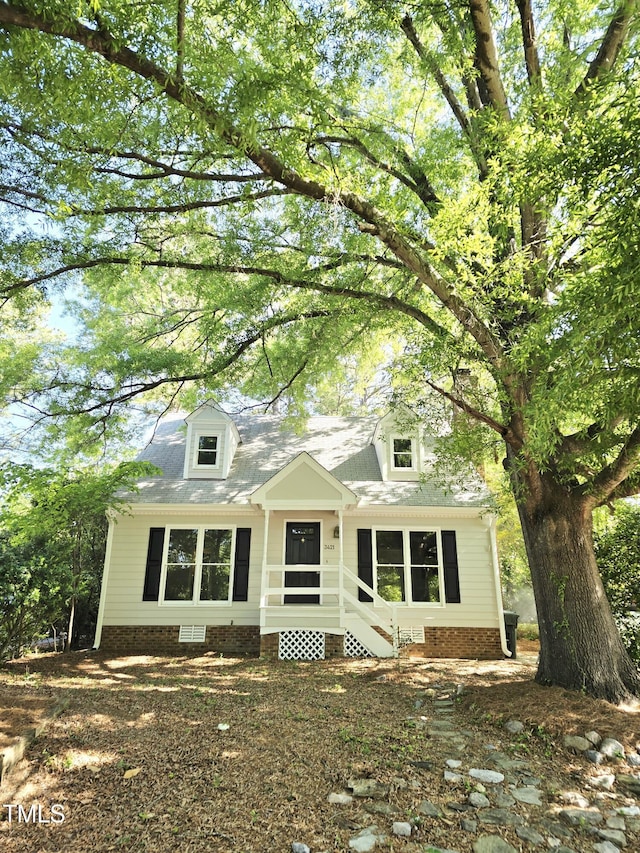 view of front of house with crawl space and entry steps