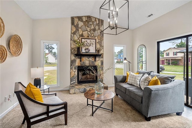 6611 Brannan Way, Fayetteville, NC 28314 - living area featuring a chandelier, baseboards, lofted ceiling, and carpet