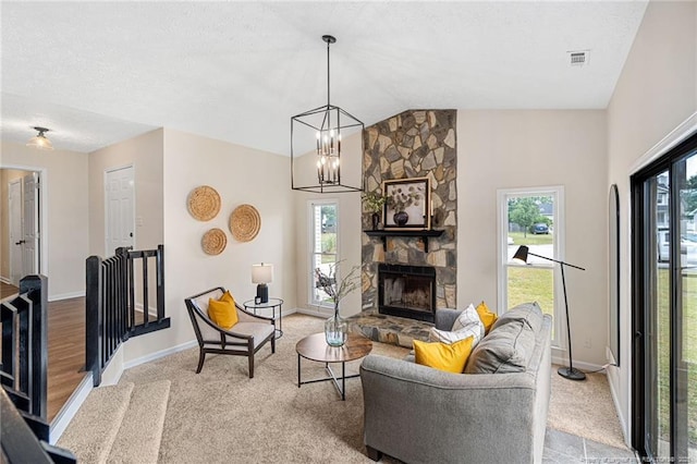 6611 Brannan Way, Fayetteville, NC 28314 - living area with carpet floors, a chandelier, baseboards, and vaulted ceiling