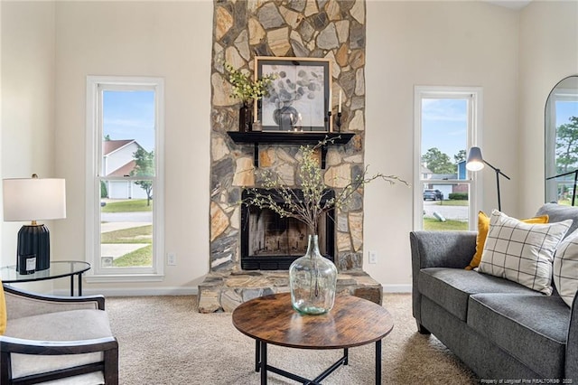 6611 Brannan Way, Fayetteville, NC 28314 - living area featuring carpet flooring, a fireplace, and baseboards