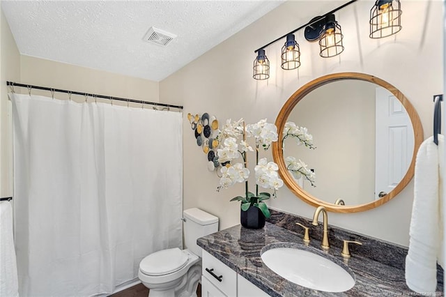6611 Brannan Way, Fayetteville, NC 28314 - bathroom with toilet, vanity, a textured ceiling, and a shower with curtain
