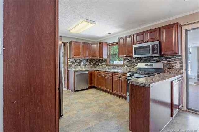 6026 Cornish St, Fayetteville, NC 28314 - kitchen with stainless steel appliances, a sink, tasteful backsplash, ornamental molding, and a peninsula