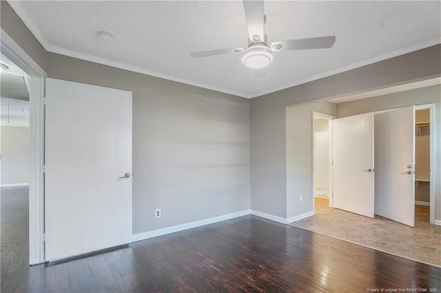 6026 Cornish St, Fayetteville, NC 28314 - unfurnished bedroom with wood finished floors, baseboards, crown molding, ceiling fan, and a textured ceiling