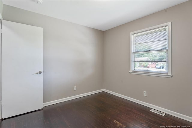 6026 Cornish St, Fayetteville, NC 28314 - spare room featuring baseboards and hardwood / wood-style floors