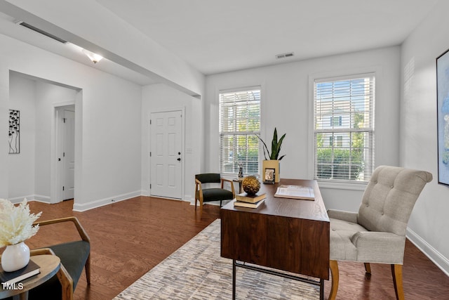 office featuring baseboards and dark wood-style flooring