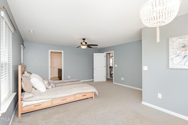 3360 Bordwell Ridge Dr, New Hill, NC 27562 - bedroom with visible vents, baseboards, ceiling fan with notable chandelier, and carpet floors
