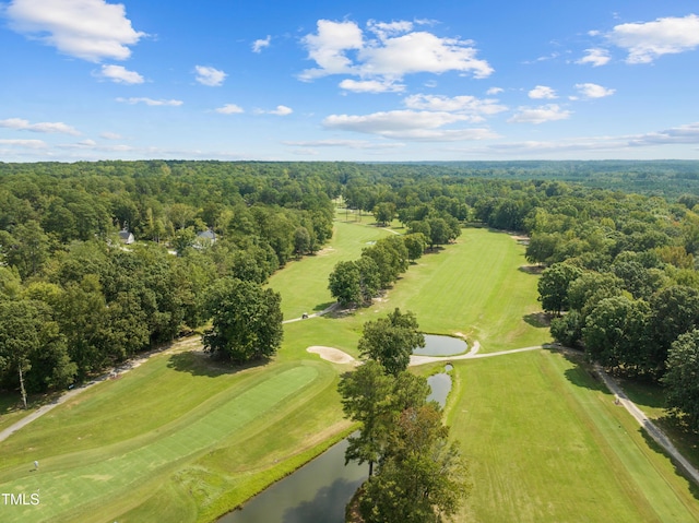 bird's eye view with a water view, a forest view, and golf course view