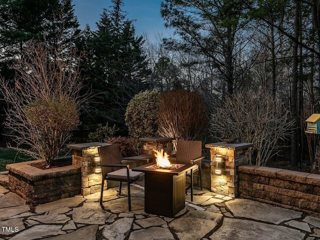 view of patio featuring an outdoor fire pit