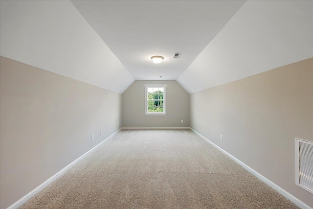 1075 Fairhaven Dr Lot 51, Mebane, NC 27302 - additional living space featuring lofted ceiling, light carpet, and baseboards