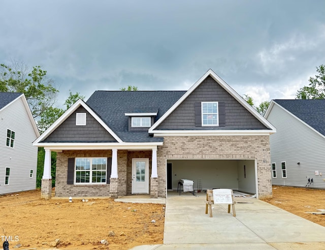1075 Fairhaven Dr Lot 51, Mebane, NC 27302 - craftsman-style house featuring brick siding, driveway, and a porch