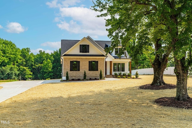 4924 Zebulon Rd, Zebulon, NC 27597 - modern inspired farmhouse with brick siding