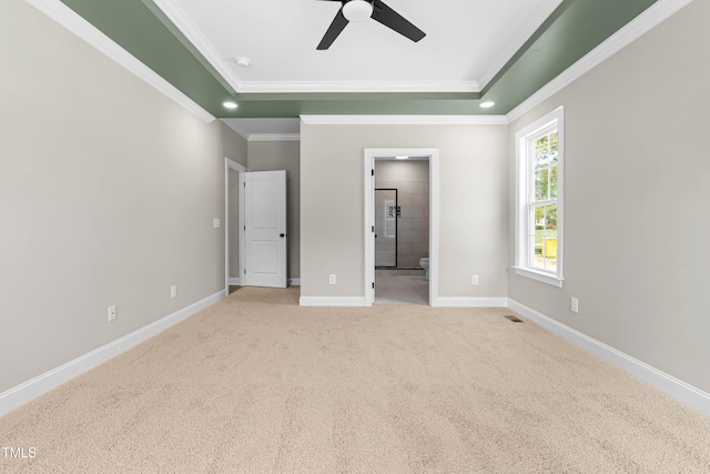 4924 Zebulon Rd, Zebulon, NC 27597 - unfurnished bedroom featuring crown molding, carpet, a raised ceiling, ensuite bath, and recessed lighting