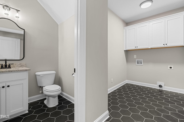 4924 Zebulon Rd, Zebulon, NC 27597 - laundry area with electric dryer hookup, hookup for a washing machine, and dark tile patterned flooring
