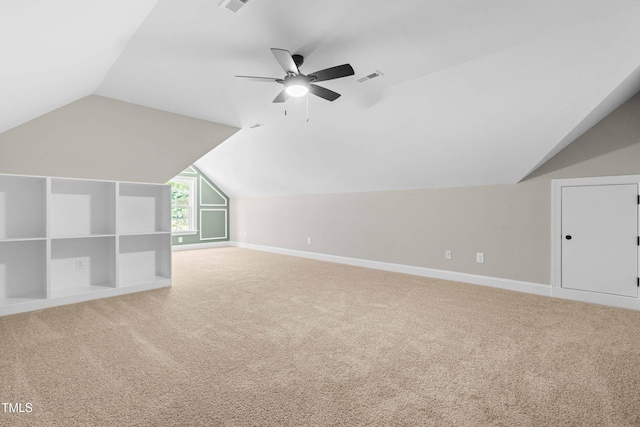4924 Zebulon Rd, Zebulon, NC 27597 - bonus room with vaulted ceiling, ceiling fan, and carpet