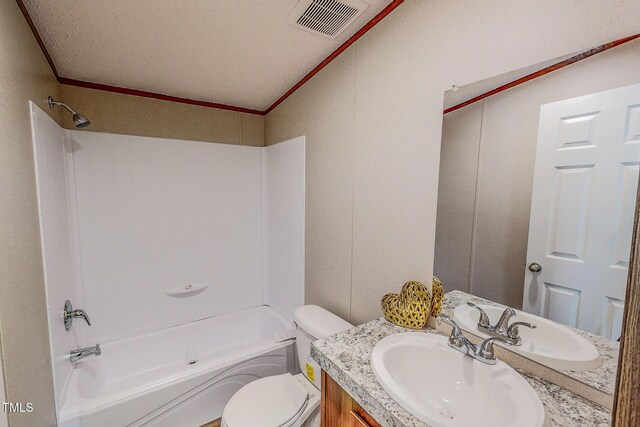 1326 Stephens Dr, Roxboro, NC 27573 - bathroom featuring vanity, washtub / shower combination, toilet, crown molding, and a textured ceiling