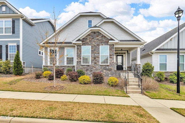233 Stone River Dr, Wendell, NC 27591 - craftsman-style house featuring stone siding