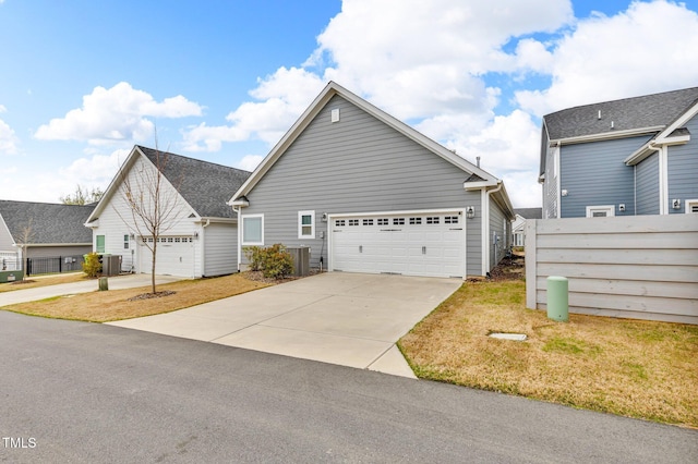 233 Stone River Dr, Wendell, NC 27591 - view of front of house with cooling unit, concrete driveway, and fence