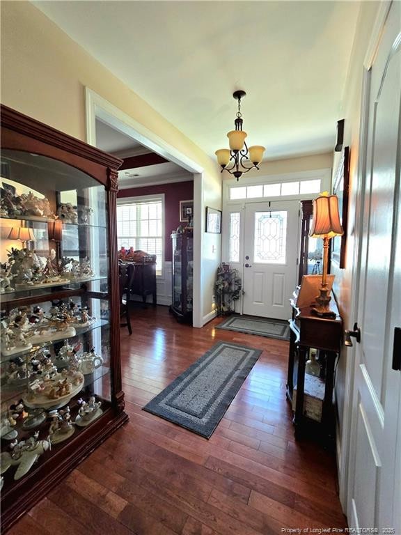 921 Satinwood Ct, Fayetteville, NC 28312 - entrance foyer featuring a chandelier and dark wood finished floors