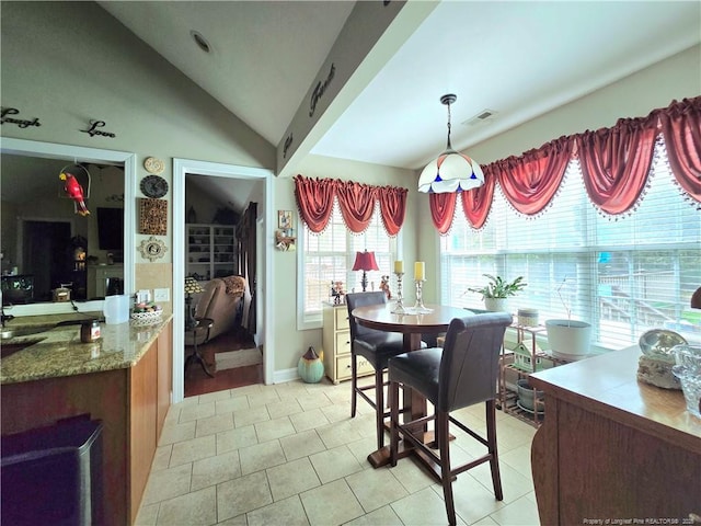 921 Satinwood Ct, Fayetteville, NC 28312 - dining room with light tile patterned floors and lofted ceiling