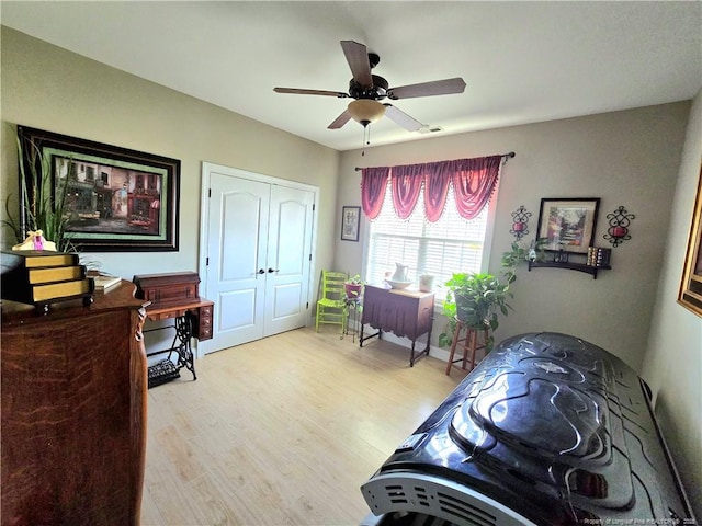 921 Satinwood Ct, Fayetteville, NC 28312 - bedroom with light wood-type flooring, a closet, and ceiling fan