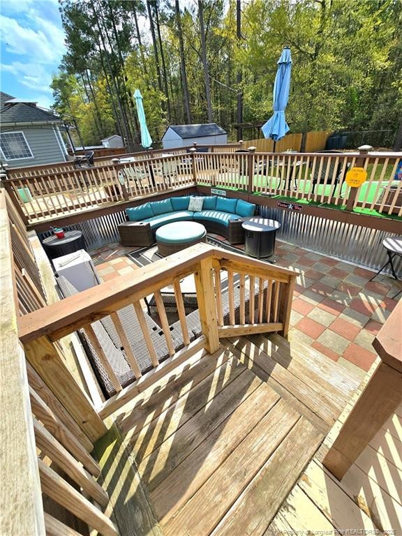 921 Satinwood Ct, Fayetteville, NC 28312 - wooden deck featuring an outdoor living space and a fenced backyard