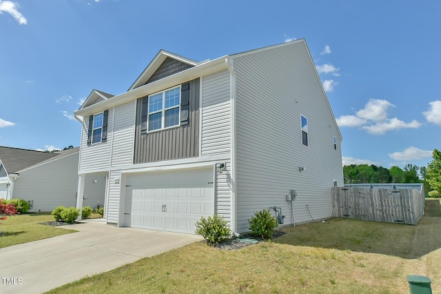 2065 Alderman Way, Creedmoor, NC 27522 - view of home's exterior featuring a garage, concrete driveway, and a lawn