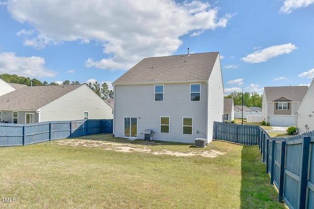 2065 Alderman Way, Creedmoor, NC 27522 - rear view of house featuring a yard, central air condition unit, and a fenced backyard