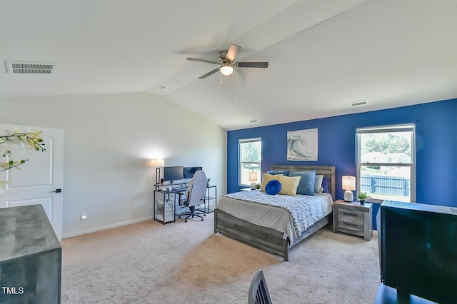 2065 Alderman Way, Creedmoor, NC 27522 - bedroom featuring multiple windows, vaulted ceiling, visible vents, and carpet floors