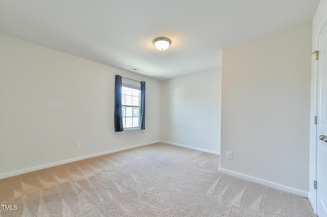 2065 Alderman Way, Creedmoor, NC 27522 - spare room with light carpet and baseboards