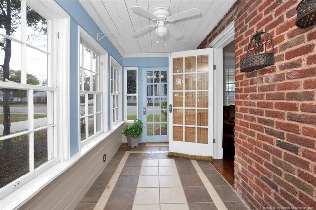 416 N Main St, Raeford, NC 28376 - unfurnished sunroom with a ceiling fan