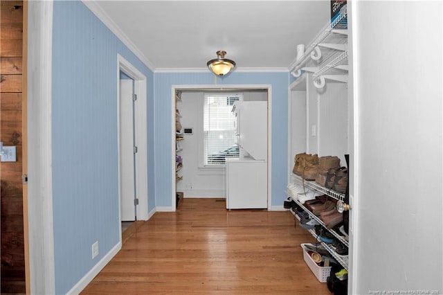 416 N Main St, Raeford, NC 28376 - hallway featuring baseboards, crown molding, and wood finished floors