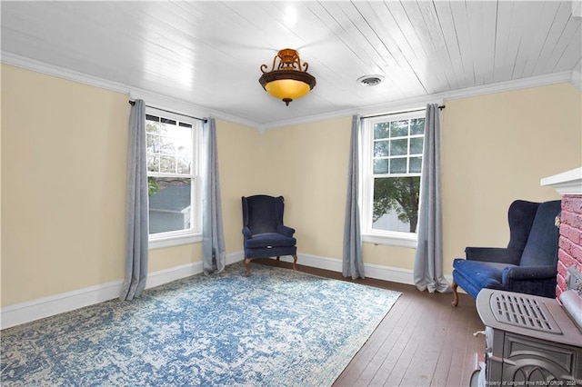 416 N Main St, Raeford, NC 28376 - living area featuring crown molding, visible vents, baseboards, and a healthy amount of sunlight
