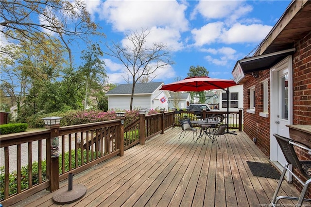 416 N Main St, Raeford, NC 28376 - wooden deck featuring outdoor dining area