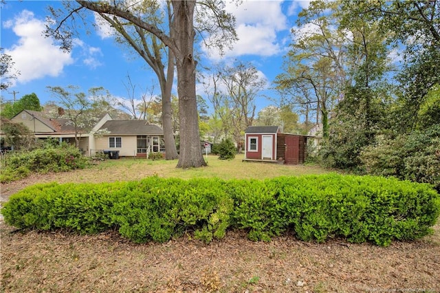 416 N Main St, Raeford, NC 28376 - view of yard with an outbuilding and a storage unit