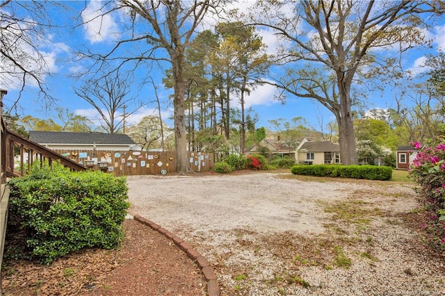 416 N Main St, Raeford, NC 28376 - view of yard featuring driveway and fence