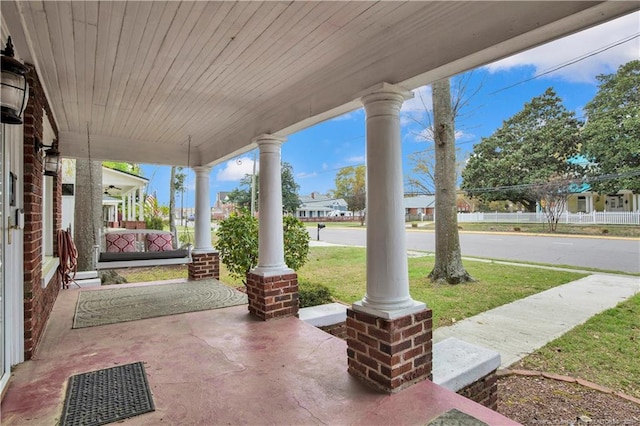 416 N Main St, Raeford, NC 28376 - view of patio featuring a porch