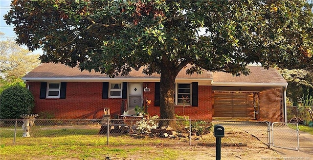 4017 Glenridge Rd, Fayetteville, NC 28304 - ranch-style house featuring a fenced front yard, brick siding, and an attached carport