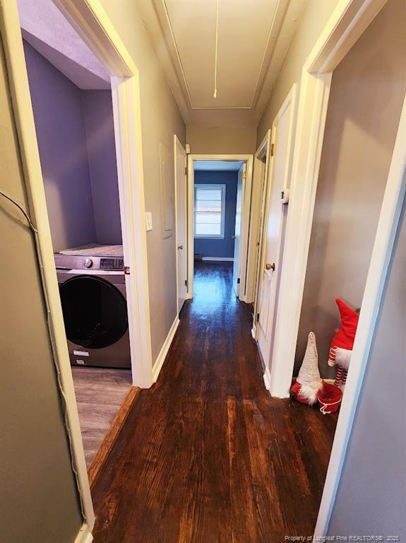 4017 Glenridge Rd, Fayetteville, NC 28304 - hallway featuring washer / clothes dryer, attic access, wood finished floors, and baseboards