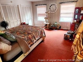 4017 Glenridge Rd, Fayetteville, NC 28304 - carpeted bedroom featuring two closets