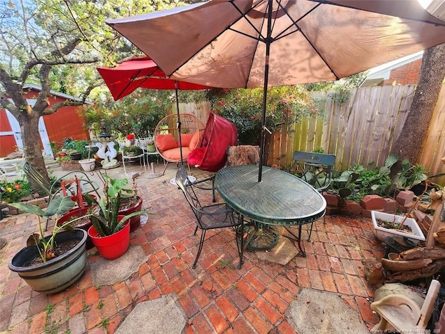 4017 Glenridge Rd, Fayetteville, NC 28304 - view of patio / terrace featuring outdoor dining area and a fenced backyard