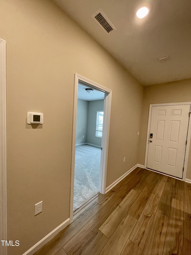 413 Diversity Way, Raleigh, NC 27610 - entrance foyer featuring dark wood-style floors and baseboards